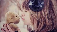 pic for Girl Kissing Teddy Bear 